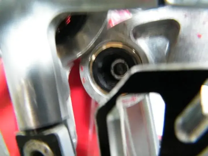 Lower front pivot with bushes installed.webp