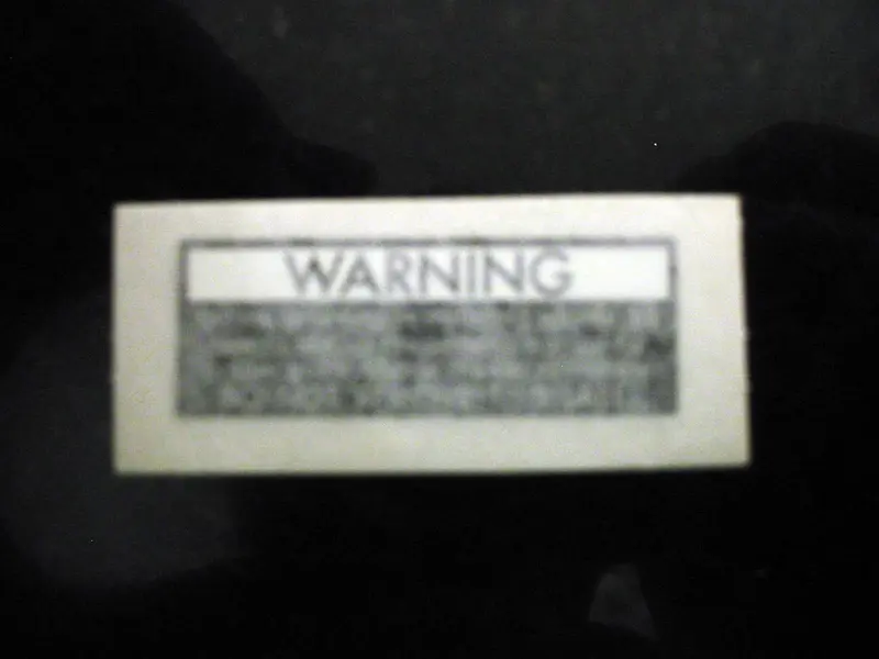 GT LTS rear triangle  rear wheel warning sticker 45mm X 15mm.webp