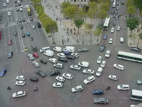 crazy Paris traffic around Arch de Triumph.webp