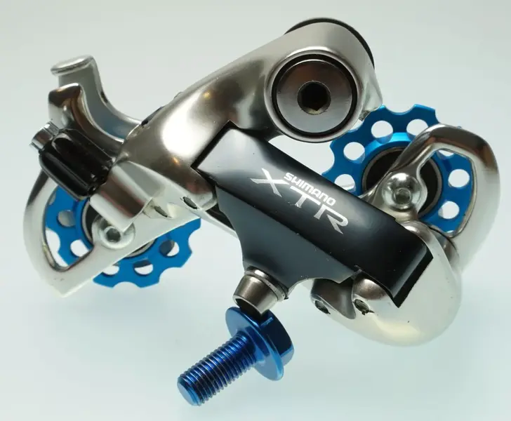 Shimano RD-M910 NOS turquoise Carmichael pulleys 01.webp
