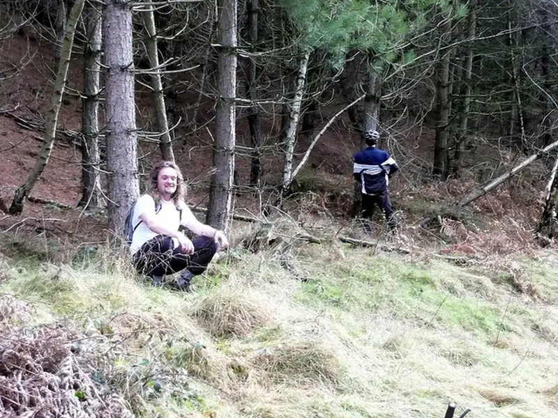 shitting in the woods.webp