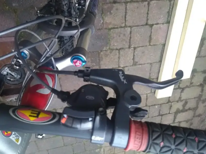 Brake level and gear shifter right.webp