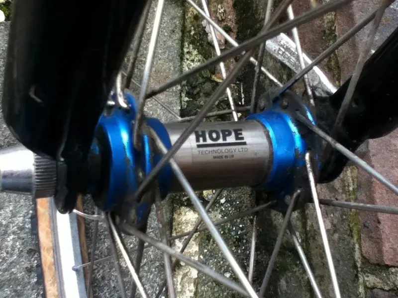 Hope UK titanium blue front hub.webp