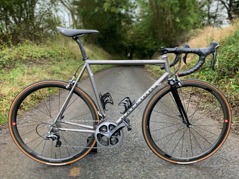 Raleigh titanium road bike deals