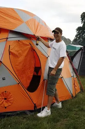 Heathy takes turn at glory hole tent.webp