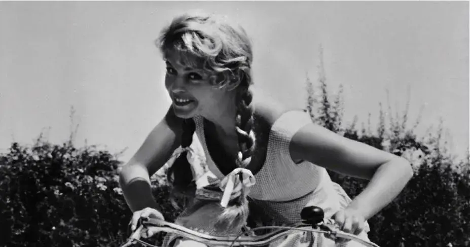 That French chick again who loves riding a bike.webp