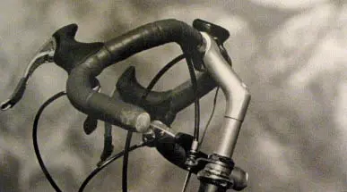 Mike V. aka ssmike  Cockpit with Bridgestone Dirt Drop stem, WTB bar and WTB inboard Suntour ...webp