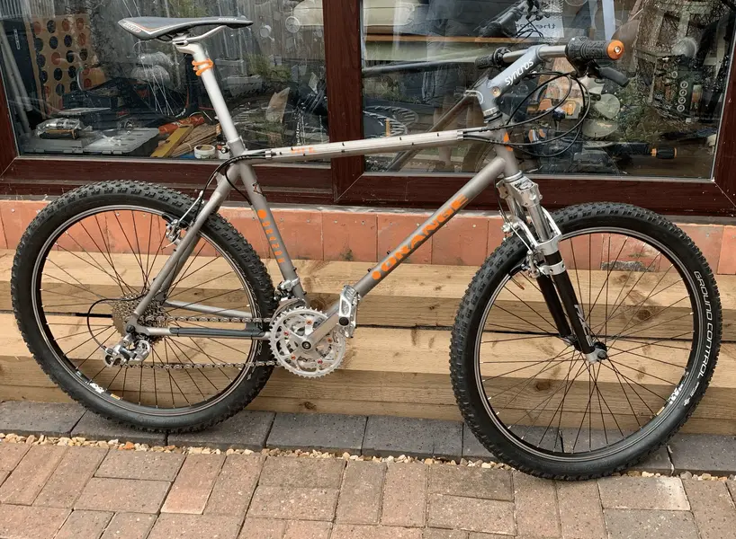 Orange titanium bike outlet