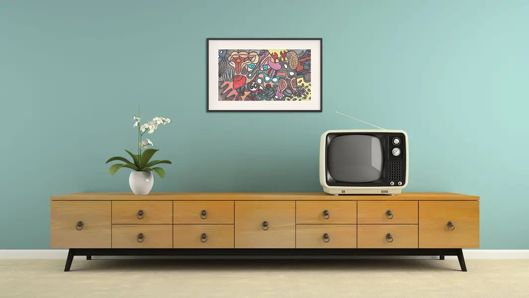 van den hooven with orchid and retro television.webp