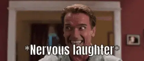 arnold-schwarzenegger-laughs.webp