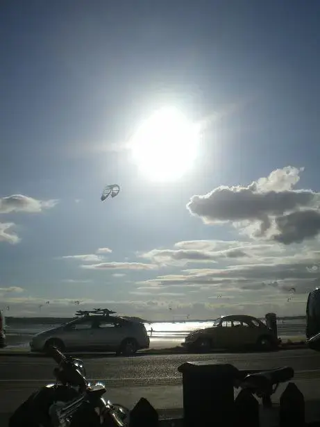 early evening sun at the pub on sandbanks, the english riviera.webp