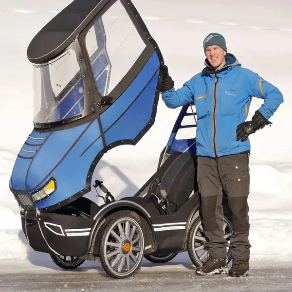 PodRide_fully-enclosed-4-wheel-recumbent-commuter-e-bike_canopy-for-scale.webp