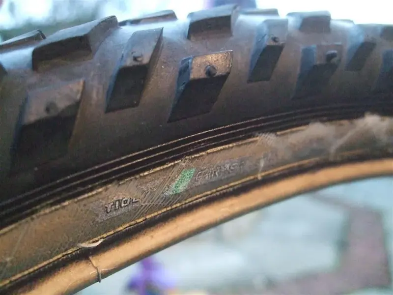 Side wall showing worn TIOGA badge.webp