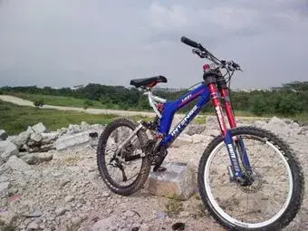 my bike on rocks.webp
