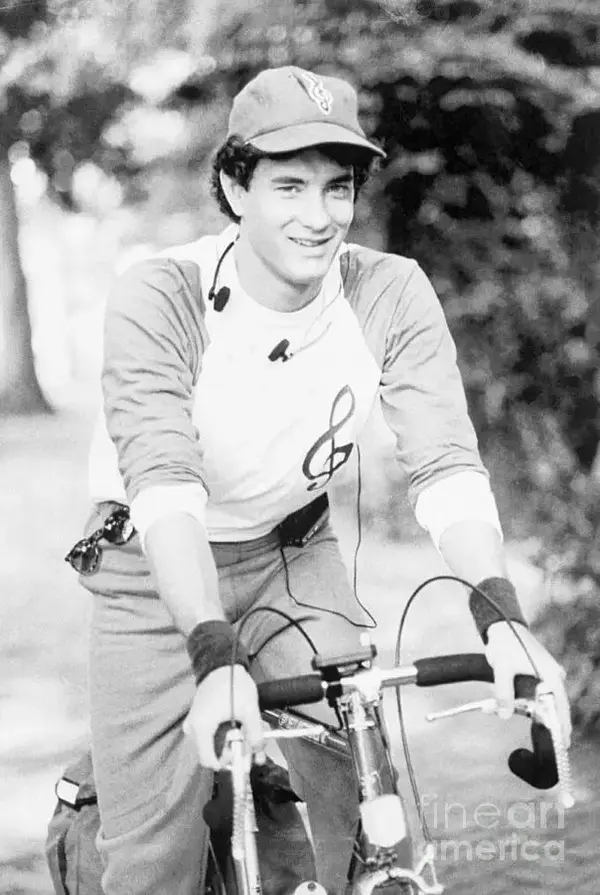 tom-hanks-riding-a-bicycle-bettmann-1593550562.webp
