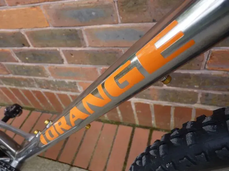 p7 orange logo.webp
