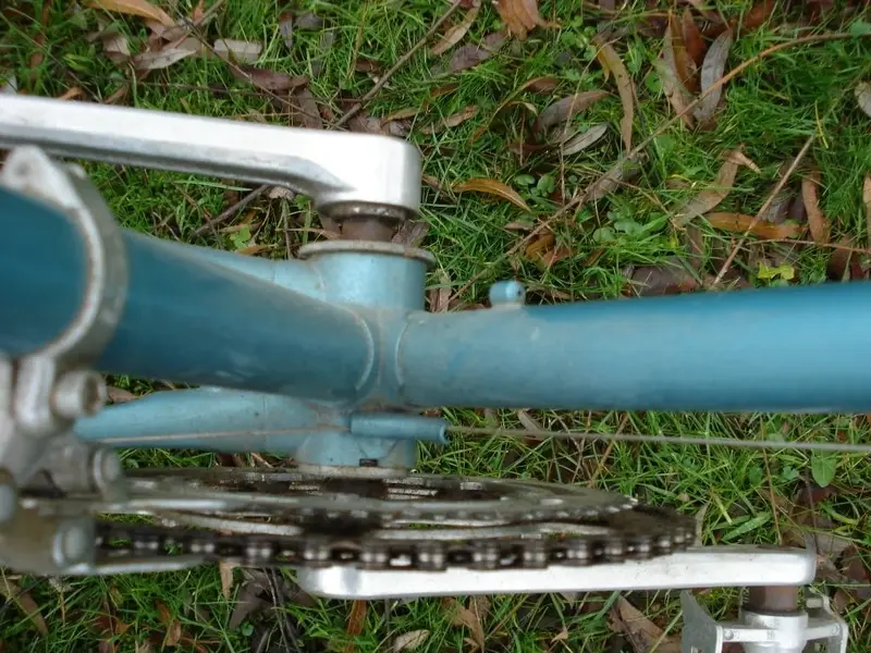 blue bike with notched shell a) .webp