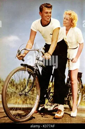 mr-and-mrs-ronald-reagan-and-jane-wyman-on-their-tandem-bicycle-py14230-k377af-2915166717.webp