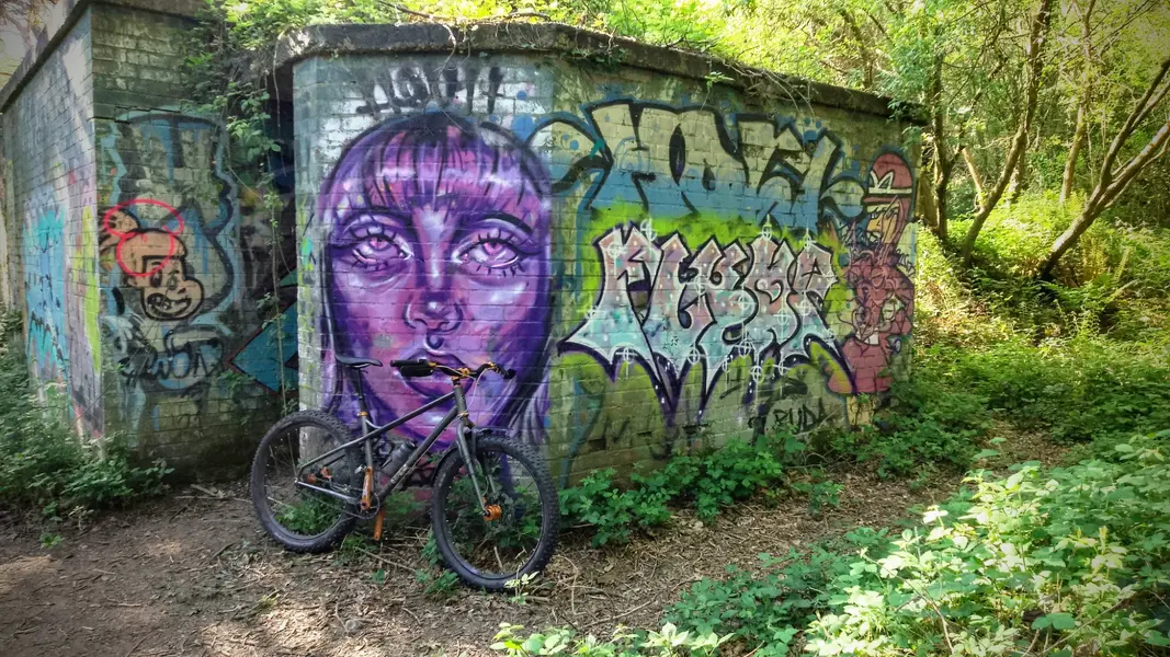 Stooge and graffiti.webp