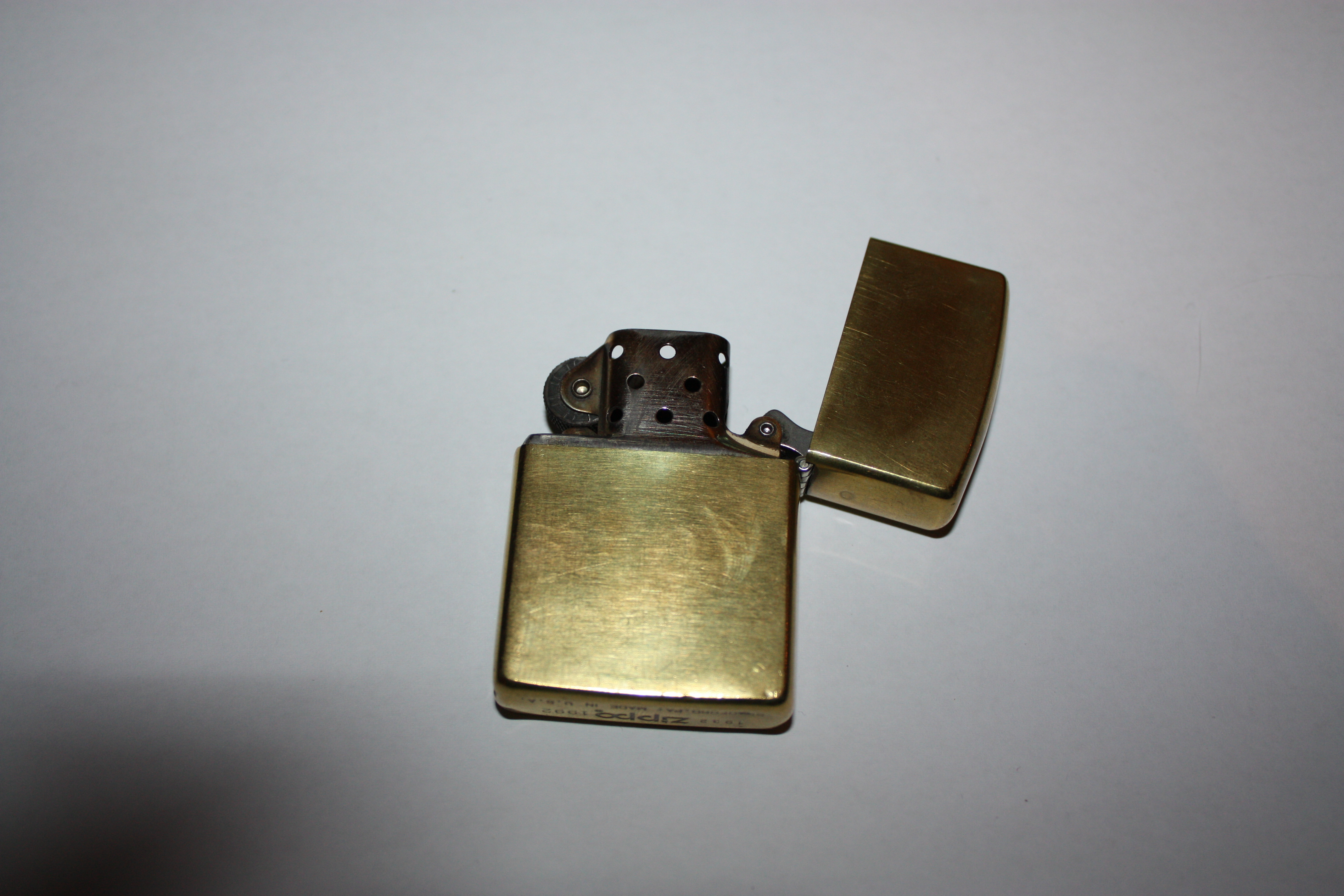 Solid_brass_Zippo_2_by_xemnasthehedgehog.jpg