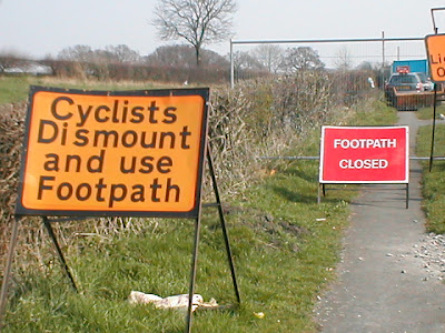 cyclists-dismount-sign.jpg